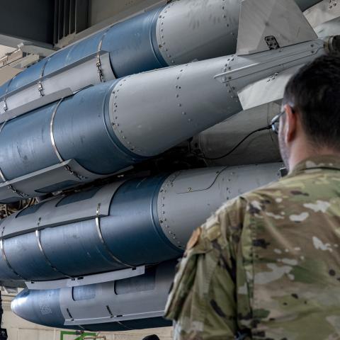 A 7th Aircraft Maintenance Squadron weapons load crew member assists in the transportation of the Launcher Load Frame to the flight-line for loading at Dyess Air Force Base, Texas, Jan. 9, 2023. The concept for pre-loading munitions has been around since the B-1 first entered service but has gone unused for 30 years until 7 AMXS resurrected the capability this winter. The LLF is a piece of equipment that allows weapons loaders to pre-load munitions on a launcher, under the cover of a facility, prior to tran