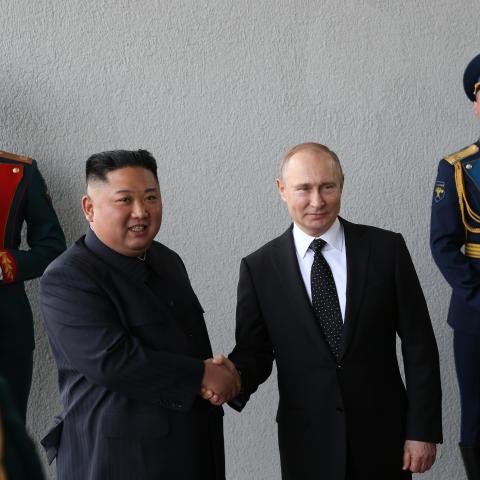 Russian President Vladimir Putin greets North Korean Leader Kim Jong-un before a meeting April 25, 2019, in Vladivostok, Russia. (Mikhail Svetlov via Getty Images)