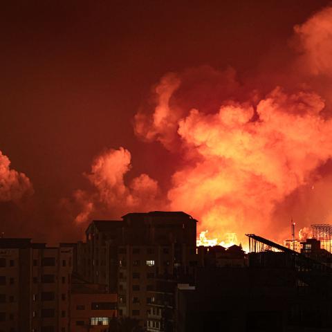 A fireball erupts during Israeli bombardment of Gaza City on October 9, 2023. (Mahmud Hams/AFP via Getty Images)
