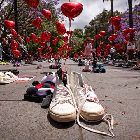 Members of the Australian Jewish community participate in a gathering called 'Balloons of Hope', which represents Israeli hostages who are currently being held by the Palestinian group Hamas, in Sydney, on October 27, 2023. (David Gray/AFP via Getty Images)