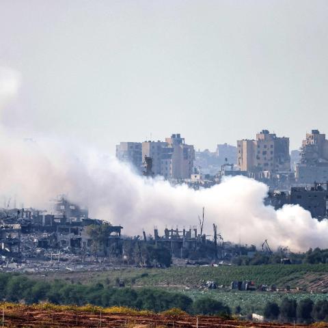 The Gaza Strip in southern Israel shows smoke plumes billowing during Israeli bombardment on October 31, 2023. (Menahem Kahama/AFP via Getty Images)
