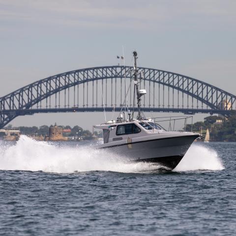 A 38-foot Steber uncrewed surface vehicle that can be used for mine-sweeping operations during a testing and evaluation event by the Royal Australian Maritime Warfare Centre and Thales in conjunction with Maritime Deployable Robotic and Autonomous Systems Experimentation Unit in Sydney on March 1, 2023. (Royal Australian Navy)