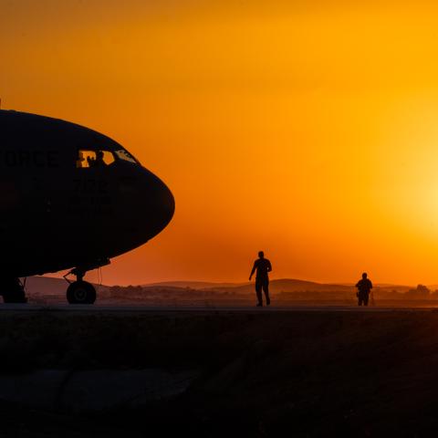 United States Air Force Airmen assigned to Ramstein Air Base in Germany guard a C-17 Globemaster III at Nevatim Base, Israel, on October 15, 2023. (Edgar Grimaldo via DVIDS)
