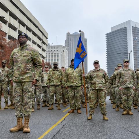 Members of the 117th Air Refueling Wing march in the National Veterans Day Parade in Birmingham, Alabama, on November 11, 2023. (US Air National Guard photo by Senior Master Sgt. Jeremy Farson)