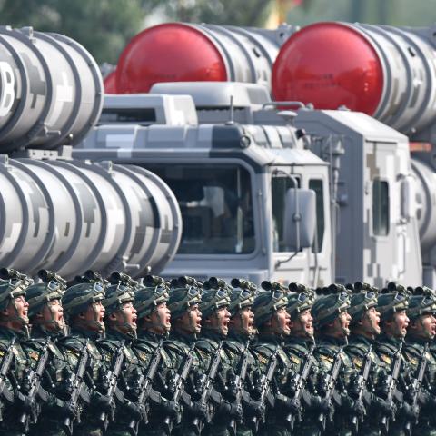 Troops take part in a military parade celebrating the seventieth founding anniversary of the People’s Republic of China in Beijing on October 1, 2019. (Photo by Zhang Hongxiang/Xinhua via Getty)