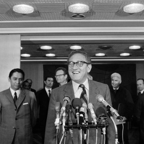 Henry Kissinger arrives at Orly airport for a new set of meetings during the Vietnam peace talks on May 17, 1973, in Paris. (AFP via Getty Images)
