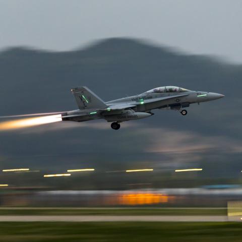 A US Marine Corps F/A-18D Hornet aircraft with Marine Fighter Attack Squadron 115 takes off from Gwangju Air Base, Republic of Korea, on April 19, 2023. (Tyler Harmon via DVIDS)