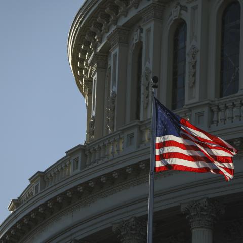 American flags and United States Capitol building are seen in Washington D.C., United States on December 28, 2022. (Celal Gunes/Anadolu Agency via Getty Images)