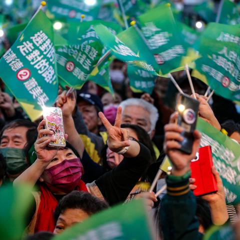 Supporters of Lai Ching-te, presidential candidate of Democratic Progressive Party (DPP), cheer during an election campaign rally in Keelung, Taiwan, on January 8, 2024. (I-Hwa Cheng/AFP via Getty Images)