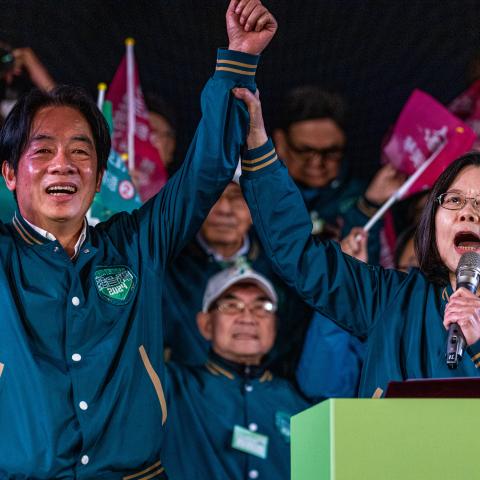 Democratic Progressive Party's presidential candidate Lai Ching-te and Taiwan's president Tsai Ing-wen cheer at the end of the campaign rally on January 11, 2024, in Taipei City, Taiwan. (Annabelle Chih via Getty Images)