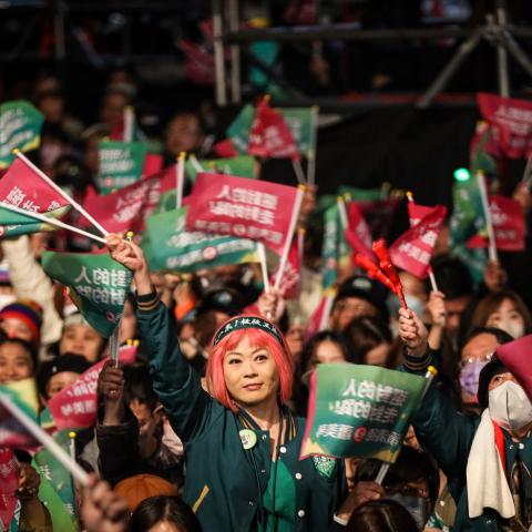 Supporters of Taiwan's Vice President and president-elect from the Democratic Progressive Party (DPP) Lai Ching-te wait for him to speak at the party's headquarters on January 13, 2024, in Taipei, Taiwan. (Annice Lyn via Getty Images)