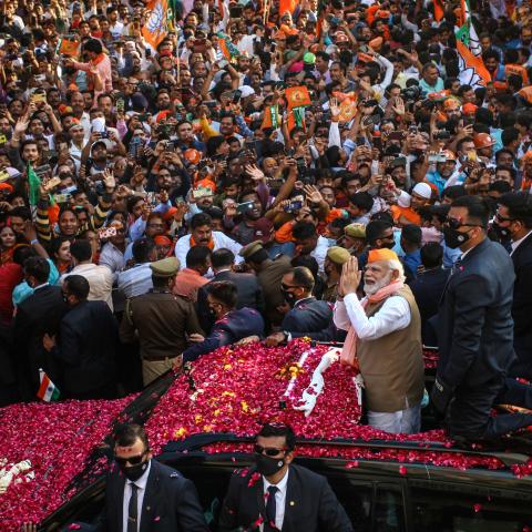 Indian Prime Minister Narendra Modi greets crowds of supporters during a roadshow in support of state elections on March 4, 2022, in Varanasi, India. (Ritesh Shukla via Getty Images)