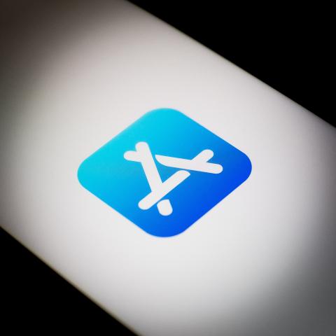 The App Store logo is displayed on a smartphone screen. (Nikolas Kokovlis/NurPhoto via Getty Images)
