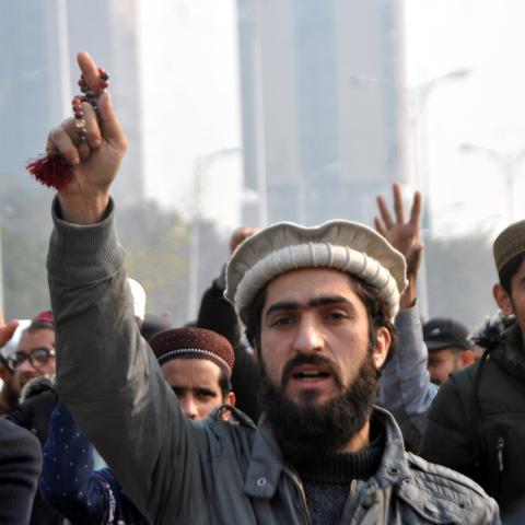 Youth activists of Muslim Talba Mahaz shout slogans during a protest against Iranian air strikes. (Raja Imran Bahadert via Getty Images)