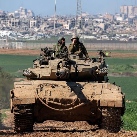 An Israeli army battle tank along the border between southern Israeli and the Gaza Strip on January 31, 2024. (Jack Guez/AFP via Getty Images)