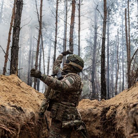  A Ukrainian soldier of the Khartia brigade throws a grenade from a trench during a training as the Russia-Ukraine war continues in Donetsk oblast, Ukraine, on February 7, 2024. (Photo by Diego Herrera Carcedo/Anadolu via Getty Images)