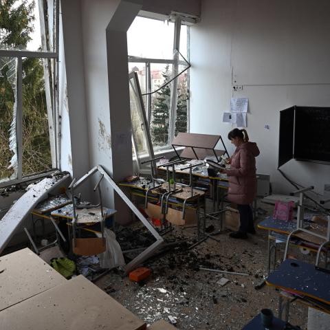A school director inspects a classroom damaged as a result of a Russian missile attack in Lviv, Ukraine, on February 15, 2024. (Yuriy Dyachyn/AFP via Getty Images)