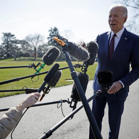 President Joe Biden stops to talk to journalists on his way to California to attend campaign receptions on February 20, 2024. (Chip Somodevilla via Getty Images)