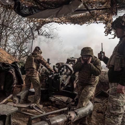 Ukrainian soldiers fire the L119 artillery in the direction of Marinka, Ukraine, on February 23, 2024. (Photo by Diego Herrera Carcedo/Anadolu via Getty Images)