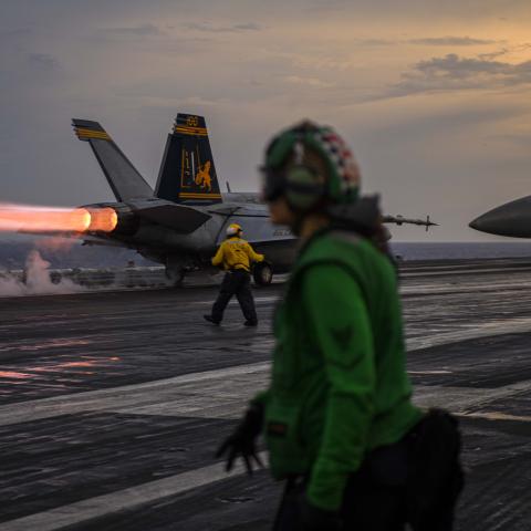 An F/A-18F Super Hornet fighter jet, attached to the "Fighting Swordsmen" of Strike Fighter Squadron 32, takes off from the flight deck aboard the Nimitz-class aircraft carrier USS Dwight D. Eisenhower (CVN 69) on July 10, 2023, in the Atlantic Ocean. (DVIDS)