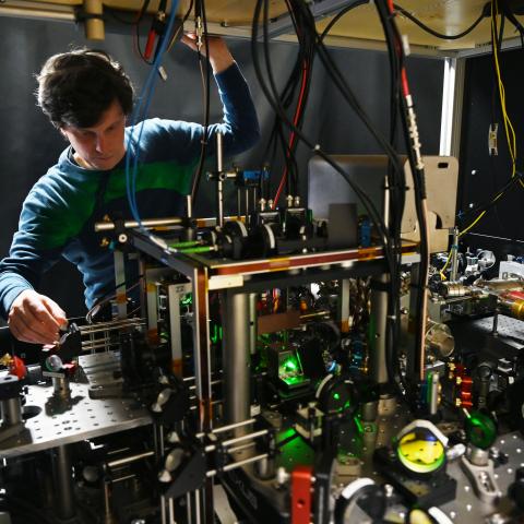Florian Meinert, group leader at the 5th Institute of Physics at the University of Stuttgart, adjusts a neutral-atom quantum computer setup in the institute's laboratory on May 3, 2023. (Photo by Marijan Murat/picture alliance via Getty Images)