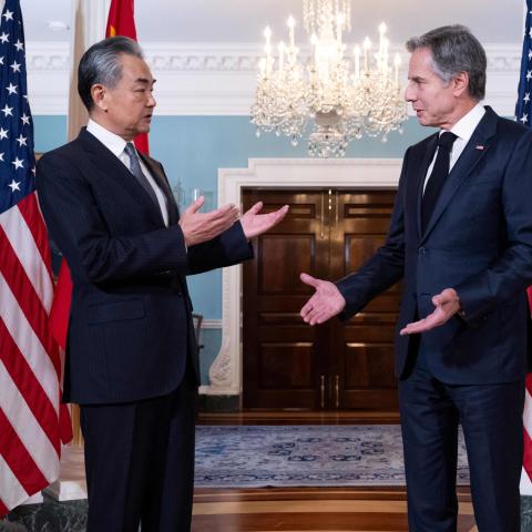 Secretary of State Antony Blinken speaks with Chinese Foreign Minister Wang Yi prior to meetings at the State Department in Washington, DC, on October 26, 2023. (Photo by Saul Loeb/AFP via Getty Images)