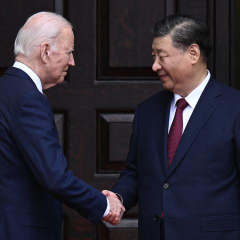 President Joe Biden greets President Xi Jinping before a meeting in Woodside, California, on November 15, 2023. (Brendan Smialowski/AFP via Getty Images)