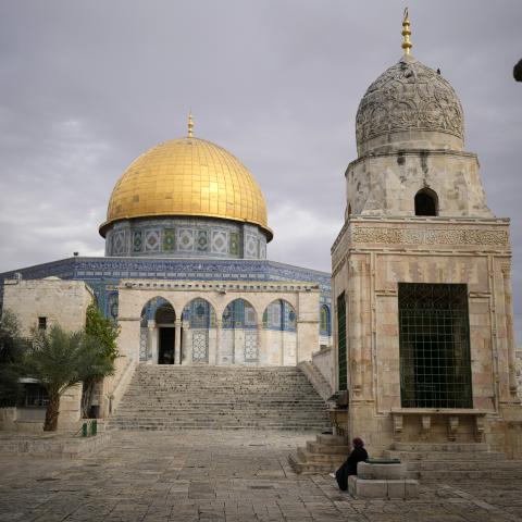 A man walks outside the near deserted historic Al-Aqsa Mosque complex on November 12, 2023, in Jerusalem. (Photo by Christopher Furlong/Getty Images)
