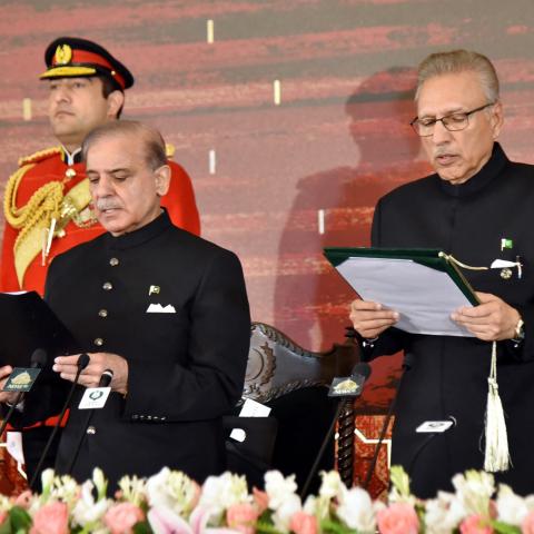 Pakistani President Arif Alvi administers the oath to newly sworn-in Prime Minister Shehbaz Sharif in Islamabad, Pakistan, on March 4, 2024. (Pakistan President House/AFP via Getty Images)