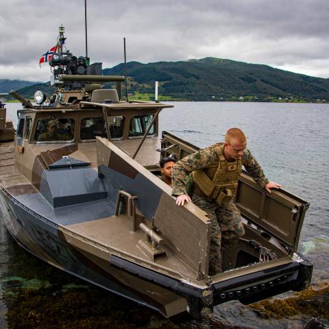 U.S. Marines assigned to the 26th Marine Expeditionary Unit (Special Operations Capable) (MEU(SOC)) disembark a Norwegian CB-90 class fast assault craft during a bilateral exercise in Narvik, Norway, Aug. 16, 2023. 