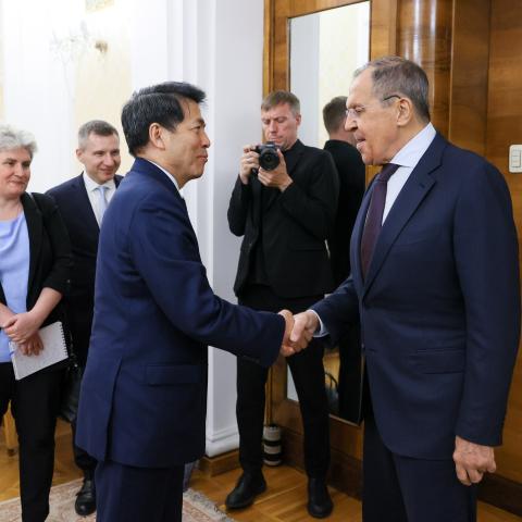 Russian Foreign Minister Sergei Lavrov welcomes the Special Representative of the Chinese Government on Eurasian Affairs Li Hui at the Russian Foreign Ministry headquarters in Moscow, Russia, on May 26, 2023. (Photo by Russian Foreign Ministry/Handout/Anadolu Agency via Getty Images)