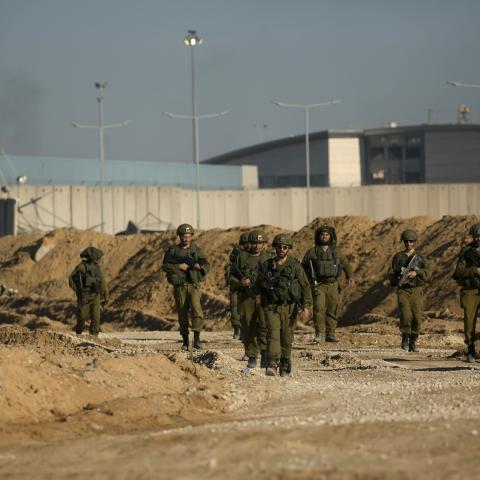 Israeli soldiers secure an area near the northern Gaza Strip on December 15, 2023. (Photo by Amir Levy/Getty Images)