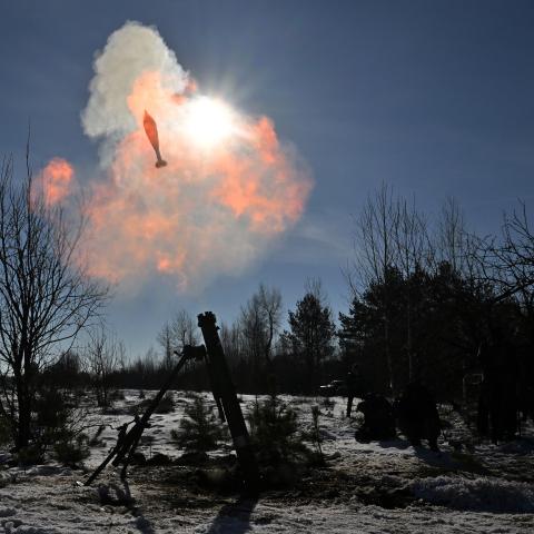 Ukrainian servicemen fire a 120mm mortar during military exercises by assault units in Zhytomyr, Ukraine, on January 30, 2024. (Photo by Sergei Supinsky/AFP via Getty Images)