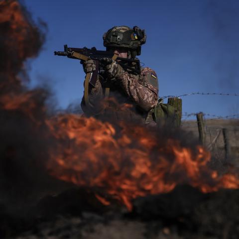 A member of a Ukrainian artillery brigade during a training session near Chasiv Yar, Ukraine, on February 27, 2024. (Photo by Cristopher Rogel Blanquet/Getty Images)