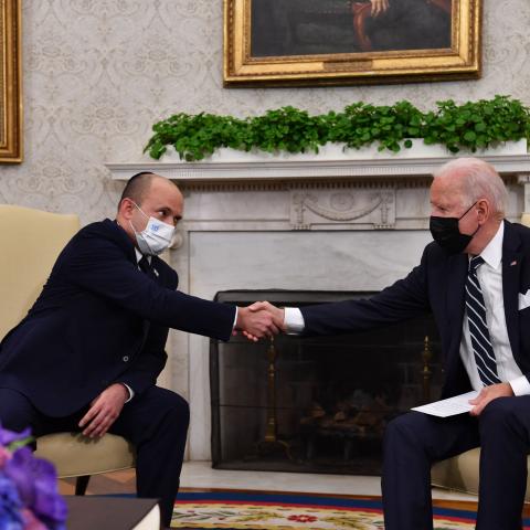 US President Joe Biden shakes hands with Israeli Prime Minister Naftali Bennett in the Oval Office of the White House in Washington, DC, on August 27, 2021. (Photo by Nicholas Kamm/AFP via Getty Images)