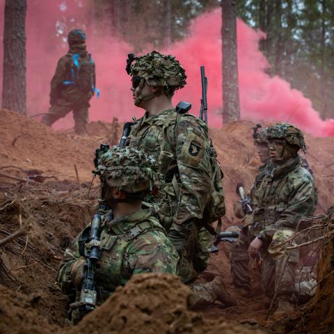 U.S. Army infantry Soldiers with Headquarters and Headquarters “Crusher” Company, 1st Battalion, 187th Infantry Regiment “Leader Rakkasans,” 3rd Brigade Combat Team, 101st Airborne Division (Air Assault), supporting 3rd Infantry Division, wait for further instruction during a force on force exercise near Tapa, Estonia, April 14, 2024.  (U.S. Army photo by Spc. Trey Gonzales)