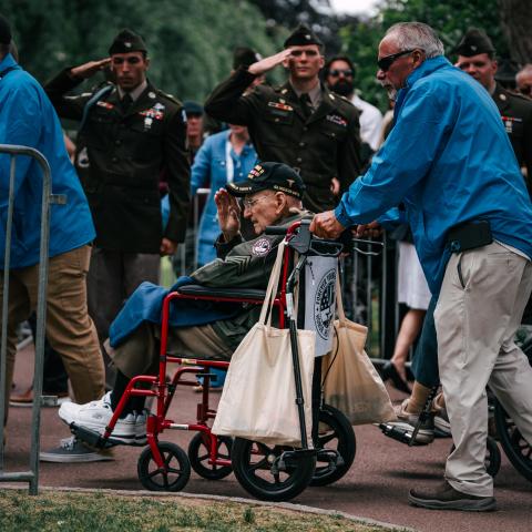 US Army Soldiers, salute a World War II veteran in France on June 6, 2024. (US Army photo by Sgt. Landon Carter)