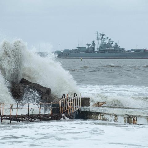 A warship is seen docked in the port of the Black Sea resort city of Sochi during a storm on November 27, 2023. (Photo by Mikhail Mordasov / AFP) (Photo by MIKHAIL MORDASOV/AFP via Getty Images)