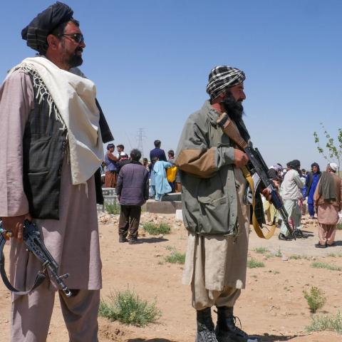 Taliban security personnel stand guard in the Guzara District, Afghanistan, on April 30, 2024. (Photo by Mohsen Karimi/AFP via Getty Images)