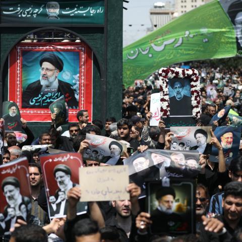 Mourners attend the funeral of Iran's President in Tehran on May 22, 2024. (Atta Kenare/AFP via Getty Images)
