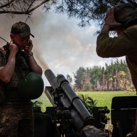 Ukrainian soldiers with the 57th Motorized Brigade operate at an artillery position on June 9, 2024 near Vovchansk, Kharkiv Region, Ukraine. Russian forces have been pressuring Ukrainian forces for weeks around the Kharkiv region. (Photo by Nikoletta Stoyanova/Getty Images)