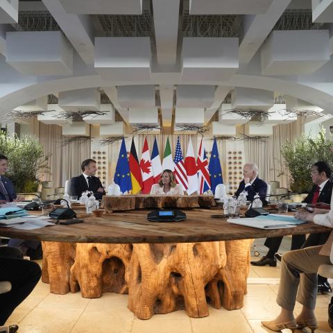 Charles Michel, Olaf Scholz, Justin Trudeau, Emmanuel Macron, Giorgia Meloni, Joe Biden, Fumio Kishida, Rishi Sunak, and Ursula von der Leyen attend a work session on June 13, 2024, in Savelletri, Italy. (Photo by Alex Brandon/AFP via Getty Images)