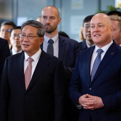 Li Qiang and Christopher Luxon visit the New Zealand Innovation and Productivity Showcase in Auckland, New Zealand, on June 15, 2024. (Photo by Brett Phibbs/AFP via Getty Images)