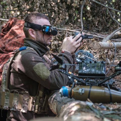 A Ukrainian soldier pilots a drone in search of targets in Kharkiv, Ukraine, on June 18, 2024. (Pablo Miranzo/Anadolu via Getty Images)