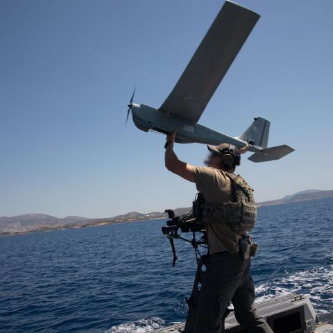 A U.S. Navy Special Warfare Combatant-Craft Crewman assigned to Naval Special Warfare deploys the Puma All Environment Unmanned Aircraft System during a training mission with Hellenic Navy special operators from the Underwater Demolition Command (DYK) in the Aegean Sea near Greece on July 15, 2020.