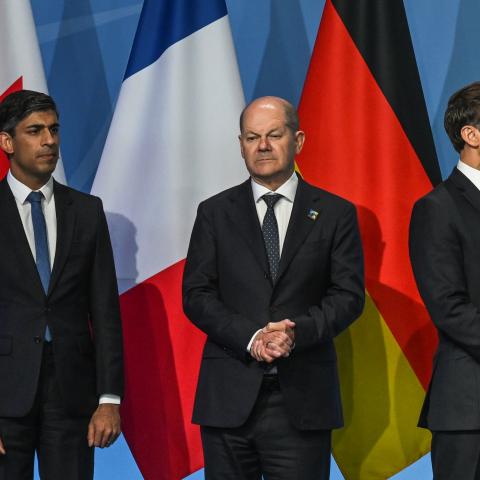 British Prime Minister Rishi Sunak, German Chancellor Olaf Scholz, and French President Emmanuel Macron at the NATO Summit on July 12, 2023, in Vilnius, Lithuania (Artur Widak/NurPhoto via Getty Images)