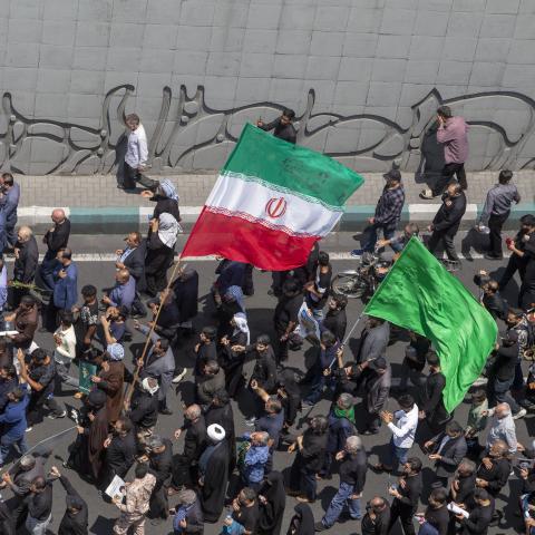 Mourners attend the funeral of Iranian President Ebrahim Raisi on May 22, 2024, in Tehran, Iran. (Majid Saeedi via Getty Images)