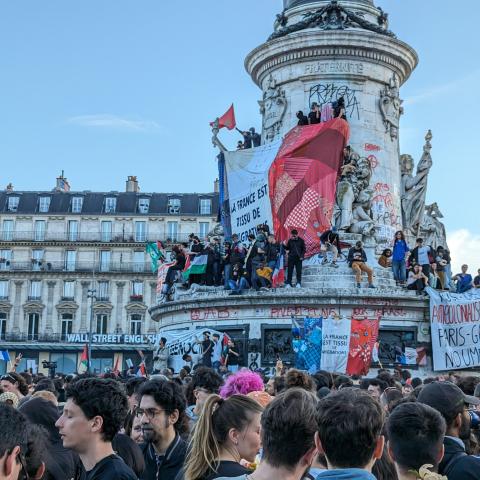 People celebrate the victory of the left-wing union after the French parliamentary elections in Paris, France, on July 7, 2024. (Luc Auffret/Anadolu via Getty Images)
