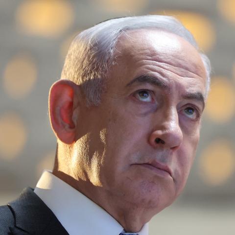Israeli Prime Minister Benjamin Netanyahu speaks during a commemoration ceremony for soldiers killed during the 2014 Gaza war, also known as Operation Protective Edge, at the Memorial Hall on Mount Herzl in Jerusalem on July 16, 2024. (Photo by ABIR SULTAN / POOL / AFP) (Photo by ABIR SULTAN/POOL/AFP via Getty Images)