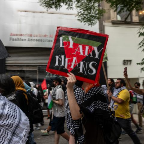 Supporters of Palestine march outside of CUNY Grad Center on July 22, 2024 in New York City. Demonstrators in support of Palestine have been critical of the city university's investments in Israel among other issues. The protest comes only days ahead of Israeli Prime Minister Benjamin Netanyahu's address to Congress. (Photo by Spencer Platt/Getty Images)